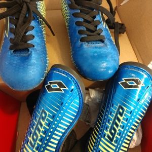 Kids soccer cleats and shin guards